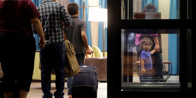 Recently reunited immigrant families seek asylum at a hotel in San Antonio on July 23, 2018.