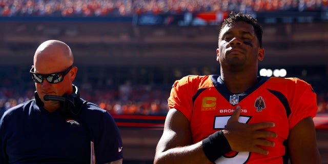 Struggling rookie head coach could lose his job if team loses next game: report 2 Head coach Nathaniel Hackett and Russell Wilson of the Broncos during the playing of the national anthem before the Houston Texans game at Empower Field At Mile High on September 18, 2022 in Denver.