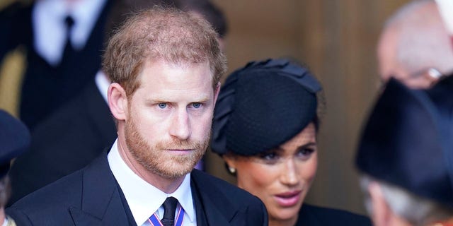 Prince Harry and Meghan, Duchess of Sussex, leave Westminster Hall, London after the coffin of Queen Elizabeth II was brought to the hall to lie in state ahead of her funeral on Monday on September 14, 2022 in London, England. 