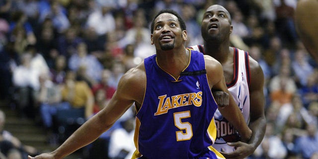 Robert Horry of the Los Angeles Lakers looks up at the ball against the Rockets at Compaq Center on March 26, 2003, in Houston, Texas.