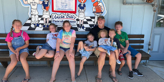 Family photo of Mark Houck, a pro-life activist arrested by the FBI, with his children.