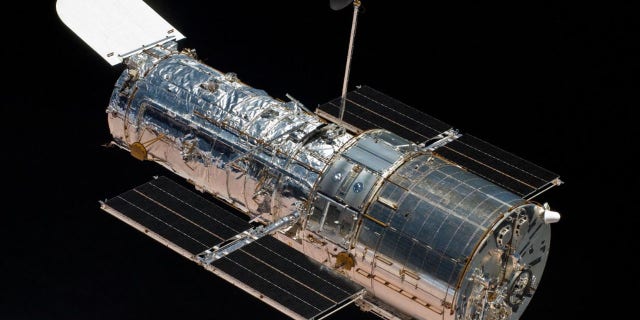 An astronaut aboard the space shuttle Atlantis captured this image of the Hubble Space Telescope on May 19, 2009.