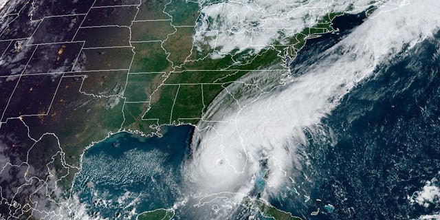 A satellite image of Hurricane Ian approaching the coast of Florida.