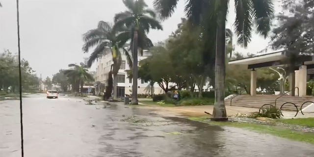 Naples, Florida streets are flooded on September 28, 2022 as the state is hit by Hurricane Ian. 