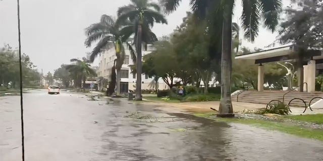 Naples, Florida streets are flooded on September 28, 2022 as the state is hit by Hurricane Ian. 