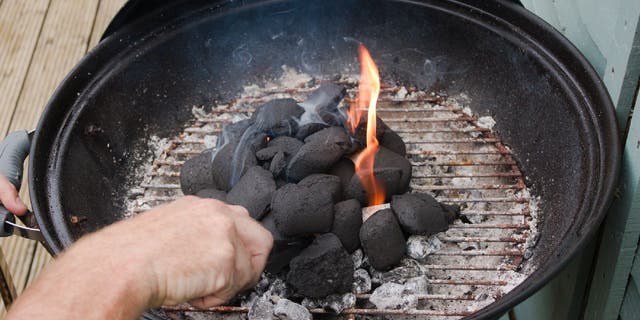 charcoal fire in circular grill