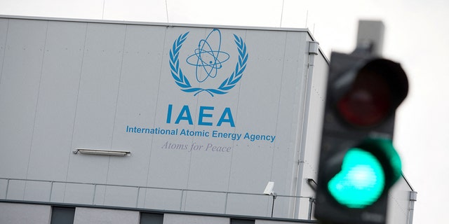 A picture taken on June 8, 2018, shows the logo of the International Atomic Energy Agency (IAEA) on the building of the IAEA laboratories in Seibersdorf, near Vienna. 
