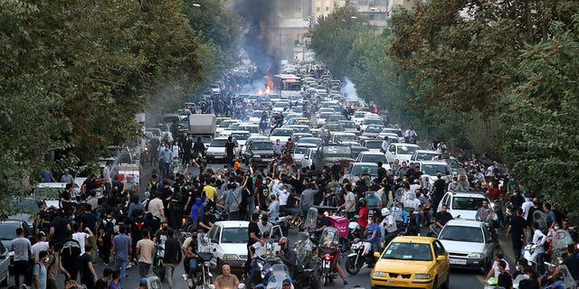 Protesters jam a street in downtown Tehran, Iran, on Wednesday, Sept. 21, 2022.