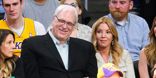 Phil Jackson and Jeanie Buss attend a New York Knicks-Los Angeles Lakers game at Staples Center on March 12, 2015, in Los Angeles.