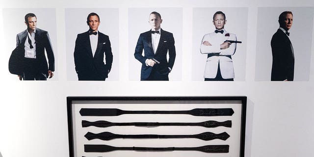 Pictured: Black bow ties, signed and worn by actor Daniel Craig, are displayed ahead of the "Sixty Years of James Bond" auction in London on Sept. 26, 2022. 