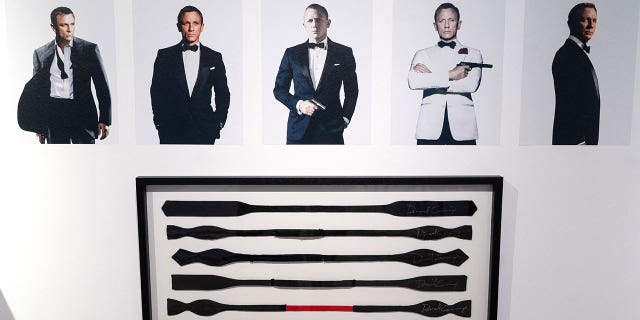 Pictured: Black bow ties, signed and worn by actor Daniel Craig, are displayed ahead of the "Sixty Years of James Bond" auction in London on Sept. 26, 2022.