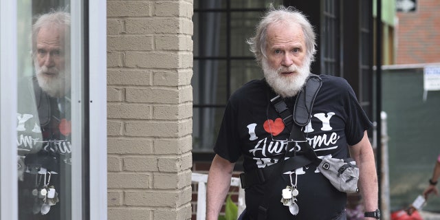 James Lewis wearing an "I love NYC" T-shirt