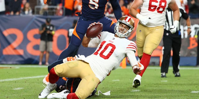 Bradley Chubb (55) of the Denver Broncos sacks Jimmy Garoppolo (10) of the San Francisco 49ers during the fourth quarter of a game at Empower Field At Mile High Sept. 25, 2022, in Denver, Colo.