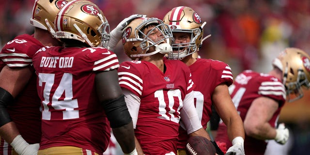 Jimmy Garoppolo (10) of the San Francisco 49ers reacts after scoring a touchdown against the Seattle Seahawks during the fourth quarter at Levi's Stadium Sept. 18, 2022, in Santa Clara, Calif.
