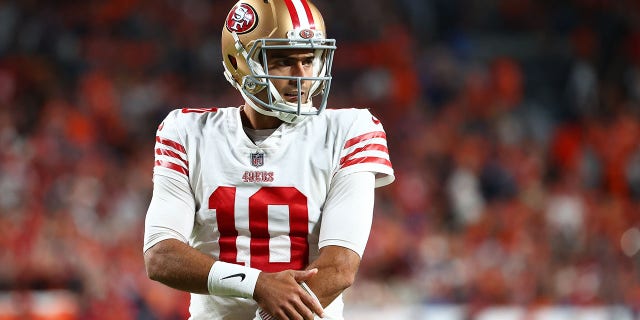 Jimmy Garoppolo of the San Francisco 49ers awaits a play call against the Denver Broncos at Empower Field At Mile High Sept. 25, 2022, in Denver, Colo.