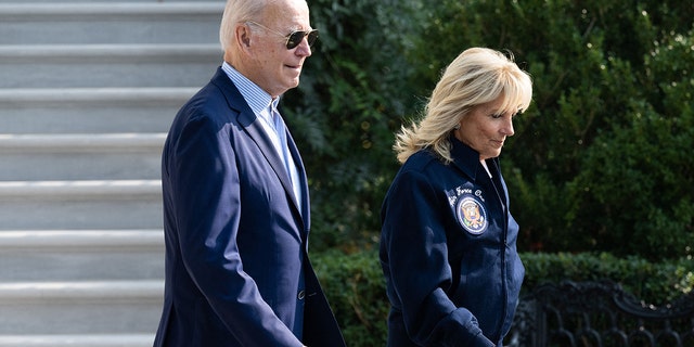 President Biden and first lady Jill Biden walk to Marine One as they depart the White House on Sept. 17, 2022. 