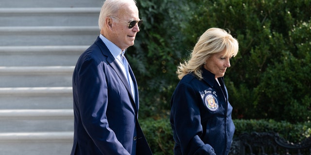 President Biden and first lady Jill Biden walk to Marine One as they depart the White House on Sept. 17, 2022. 