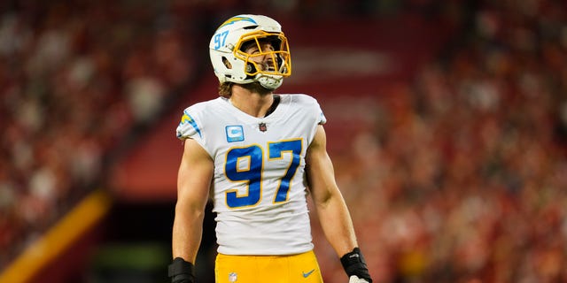 Joey Bosa #97 of the Los Angeles Chargers looks at the scoreboard against the Kansas City Chiefs at GEHA Field at Arrowhead Stadium on September 15, 2022 in Kansas City, Missouri.