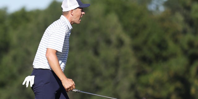 Jordan Spieth of the United States Team celebrates winning a match 2-and-1 over Adam Scott and Cam Davis of Australia and the International Team during Friday four-ball matches at the 2022 Presidents Cup at Quail Hollow Country Club Sept. 23, 2022, in Charlotte, N.C.