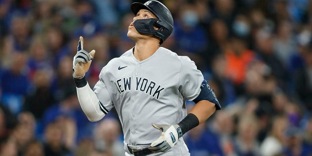 Aaron Judge of the New York Yankees rounds the bases on a solo home run in the sixth inning of a game against the Toronto Blue Jays at Rogers Centre May 3, 2022, in Toronto.