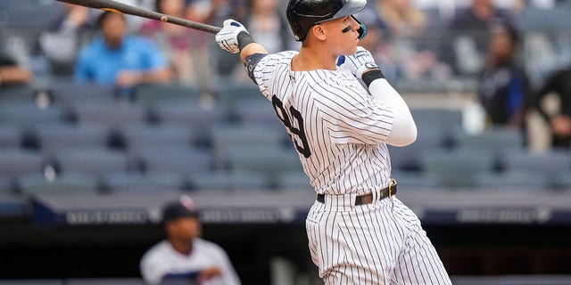 Aaron Judge (99) of the New York Yankees bats and hits a home run against the Minnesota Twins on September 2, 2022, at Yankee Stadium in New York, New York.