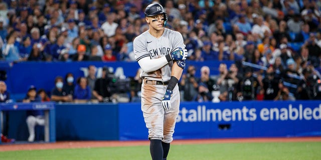 Aaron Judge of the New York Yankees walks in the eighth inning of a game against the Toronto Blue Jays at Rogers Centre Sept. 27, 2022, in Toronto.