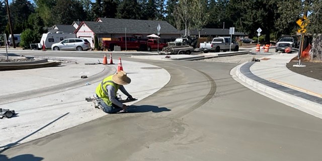A contract crew was working to fix the damage that the driver caused.