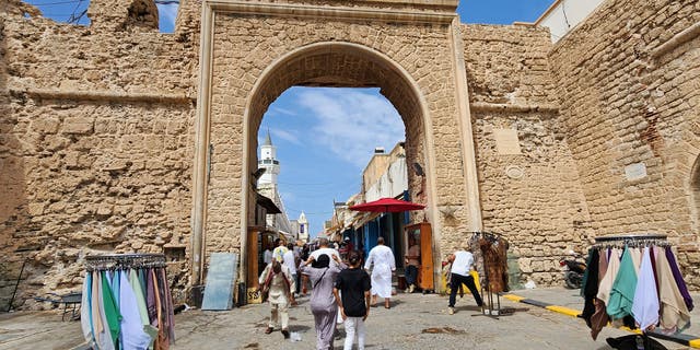 Decades of civil conflict drags on in Libya as a bloody weekend caused my militia infighting kills five people. Pictured: People shop at a market in Libya's capital Tripoli on September 20, 2022.