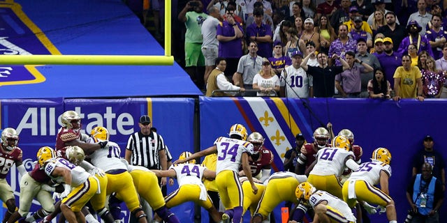 Place kicker Damian Ramos #34 of the LSU Tigers kicks the ball against the Florida State Seminoles at Caesars Superdome on September 04, 2022, in New Orleans, Louisiana.