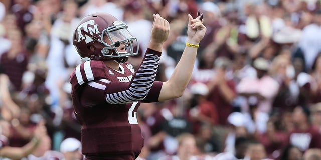 Johnny Manziel #2 of the Texas A&M Aggies celebrates a third quarter touchdown during the game against the Rice Owls at Kyle Field on August 31, 2013 in College Station, Texas. 