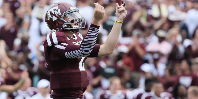 Johnny Manziel #2 of the Texas A&M Aggies celebrates a third quarter touchdown during the game against the Rice Owls at Kyle Field on August 31, 2013 in College Station, Texas.