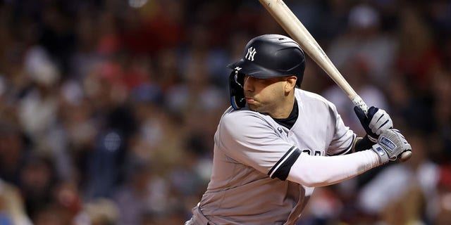 Marwin Gonzalez #14 of the New York Yankees at bat against the Boston Red Sox during the fifth inning at Fenway Park on Sept. 13, 2022 in Boston, Massachusetts.