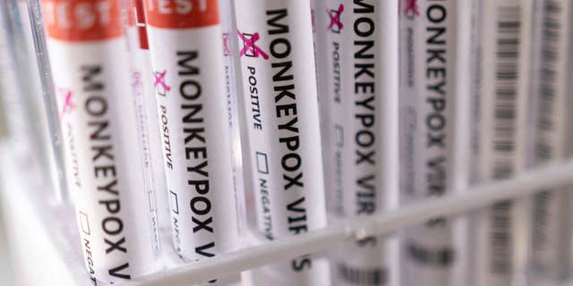 Health officials have discovered that administering the monkeypox vaccine through intradermal injection, or injecting a small dose in between layers of skin, is just as effective as the traditional method and allows a single dose to be used to vaccinate five people instead of one. Pictured: Monkepox test tubes with "positive" checked in this illustration taken on May 22, 2022.
