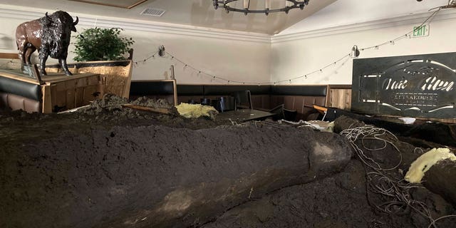 Doris Jagiello, 62, was found dead on Sept. 16 after a mudslide ripped through her home in the San Berardino Mountains. Pictured: Damage from a mudslide inside the Oak Glen Steakhouse and Saloon in Oak Glen, California, on Sept. 14, 2022.