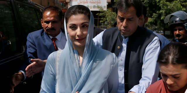Maryam Nawaz and her husband Muhammad Safdar appear in court in Islamabad, Pakistan, on Sept. 23, 2020.
