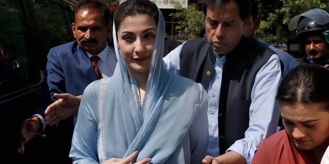 Maryam Nawaz and her husband Muhammad Safdar appear in court in Islamabad, Pakistan, on Sept. 23, 2020.