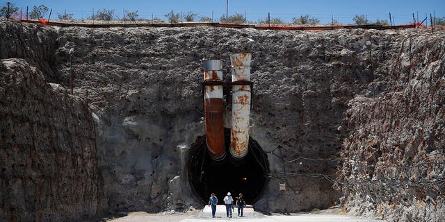 Nevada is pressuring the U.S. to finally scrap its already mothballed plan on how to dispose the country’s most hazardous nuclear waste. Pictured: People leaving the Yucca Mountain during a congressional tour on July 14, 2018, near Mercury, Nevada. 