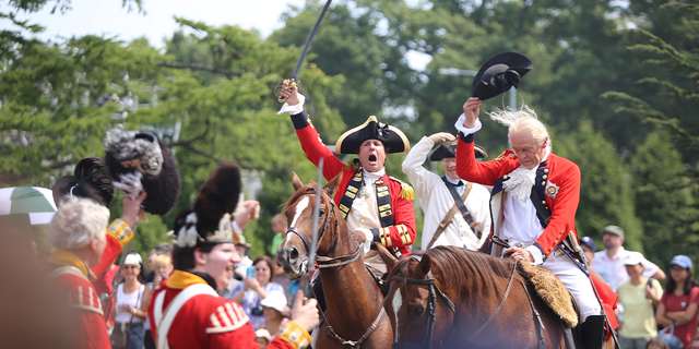 Redcoats offer cheer after re-enacting their victory in the Battle of Brooklyn. The 239th anniversary of the Battle of Brooklyn was reenacted in Green-Wood Cemetery in Brooklyn.
