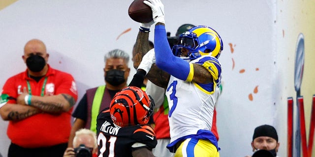 Odell Beckham Jr. (3) of the Los Angeles Rams makes a catch over Mike Hilton (21) of the Cincinnati Bengals for a touchdown in the first quarter during Super Bowl LVI at SoFi Stadium Feb. 13, 2022, in Inglewood, Calid.