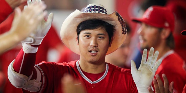 Shohei Ohtani of the Los Angeles Angels celebrates his second home run against the Detroit Tigers at Angel Stadium of Anaheim on Sept. 5, 2022.
