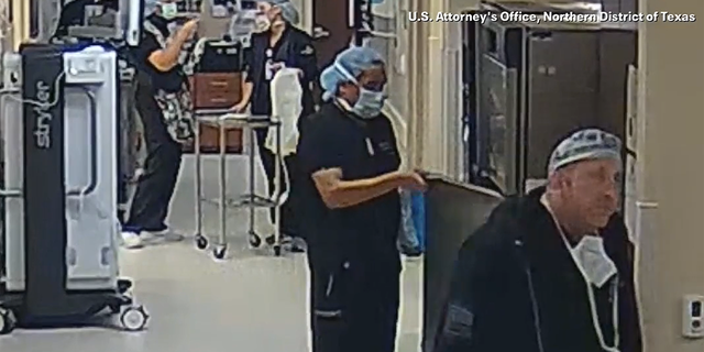 Prosecutors provided video that appears to show Dr. Raynaldo Rivera Ortiz Jr. placing an IV bag into a warmer next to an operating room before walking away on Aug. 19, 2022. A staffer retrieved the bag later, and a patient went into cardiac arrest, according to a federal criminal complaint.