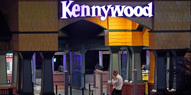 Security guards are seen guarding the entrance of Kennywood Park in Pennsylvania early on Sept 25, 2022, the morning after a shooting left three people injured.