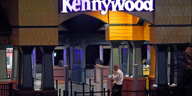 Security guards are seen guarding the entrance of Kennywood Park in Pennsylvania early on Sept 25, 2022, the morning after a shooting left three people injured.