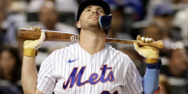 New York Mets' Pete Alonso reacts to striking out during the fourth inning of the team's baseball game against the Chicago Cubs on Wednesday, Sept. 14, 2022, in New York.