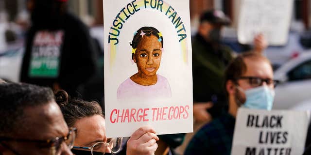 Fanta Bility, a drawing of her pictured here on a poster at a protest at the Delaware County Courthouse in Media, Pennsylvania., on Jan. 13, 2022, was shot and killed by police who opened fire on a vehicle at a high school football game.