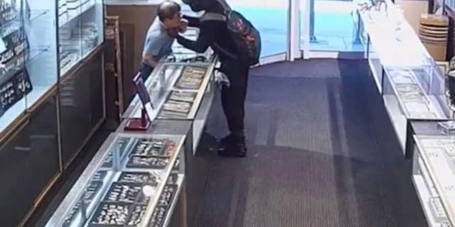 Surveillance footage depicts the 68-year-old owner of Solid Gold, a jewelry store in Wilmington, Delaware, being pistol-whipped.