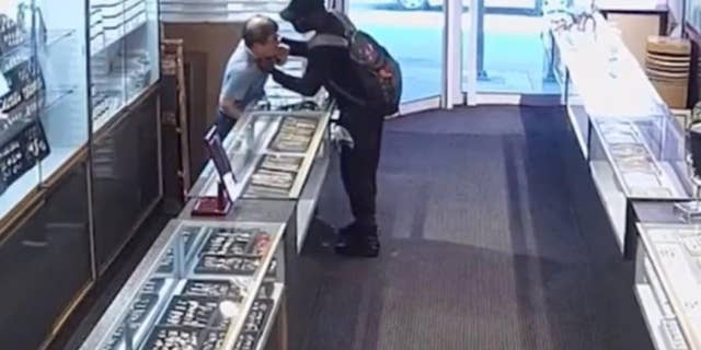 Surveillance footage depicts the 68-year-old owner of Solid Gold, a jewelry store in Wilmington, Delaware, being pistol-whipped.