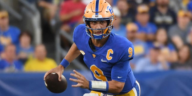 Kedon Slovis of the Pittsburgh Panthers scrambles out of the pocket in the first quarter during a game against the West Virginia Mountaineers at Acrisure Stadium Sept. 1, 2022, in Pittsburgh.