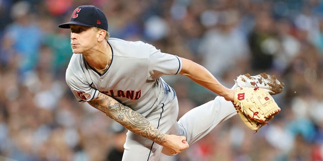 Zach Plesac of the Cleveland Guardians pitches during the first inning against the Seattle Mariners at T-Mobile Park Aug. 27, 2022, in Seattle.