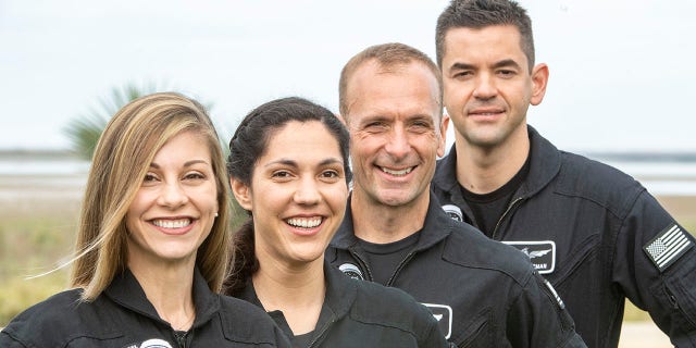 BOCA CHICA, TX - FEBRUARY 11: The crew of SpaceX's upcoming private astronaut flight called Polaris Dawn, (left to right) Anna Menon, who works in Astronaut Operations Development for SpaceX, Sarah Gillis, Senior Operations Engineer space companies, SpaceX, Scott Poteet, who served as mission director for the Inspiration4 SpaceX mission, and Jared Isaacman, who is funding the mission, pose at the Starbase Complex in Boca Chica. 